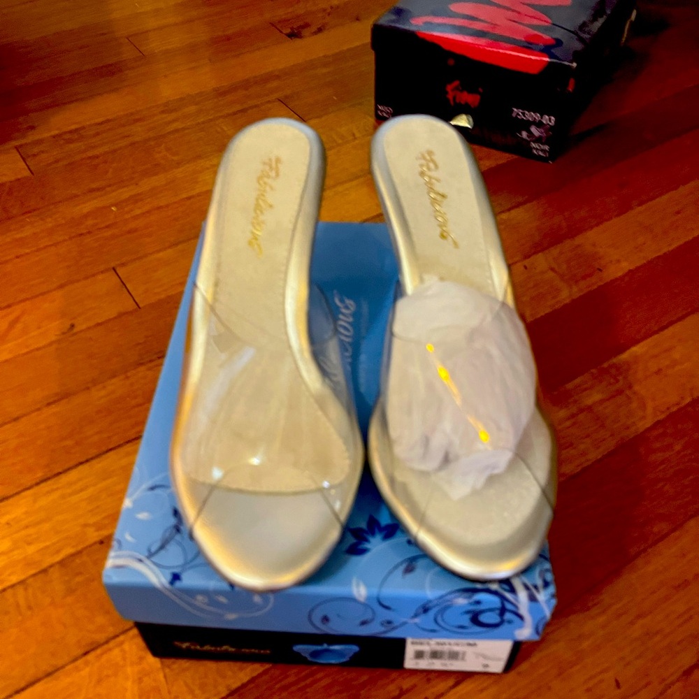 Brand new Lucite dress shoes. Never warn.  In original box with dust covers.